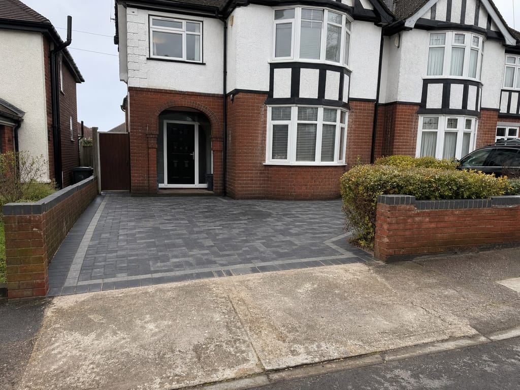Charcoal block paving replacing a front garden on a 1930s semi in Shirley